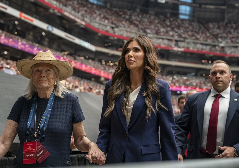 Homeland Security Secretary Kristi Noem at Charlie Kirk’s memorial. (Loren Elliott/The New York Times)