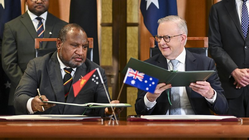 Anthony Albanese and his Papua New Guinea counterpart James Marape sign the Pukpuk Treaty at Parliament House in Canberra. 