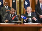 Anthony Albanese and his Papua New Guinea counterpart James Marape sign the Pukpuk Treaty at Parliament House in Canberra. 
