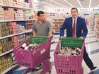 Luis Guzman and Adam Sandler in Punch-Drunk Love.