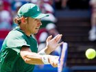 Alex de Minaur returns against Kamil Majchrzak during his victory at the Shanghai Masters. (EPA PHOTO)
