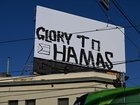 The graffiti on a bill board on thecorner of Brunswick Street and Alexandra Parade in Fitzroy.
