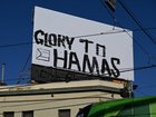 The graffiti on a bill board on thecorner of Brunswick Street and Alexandra Parade in Fitzroy.