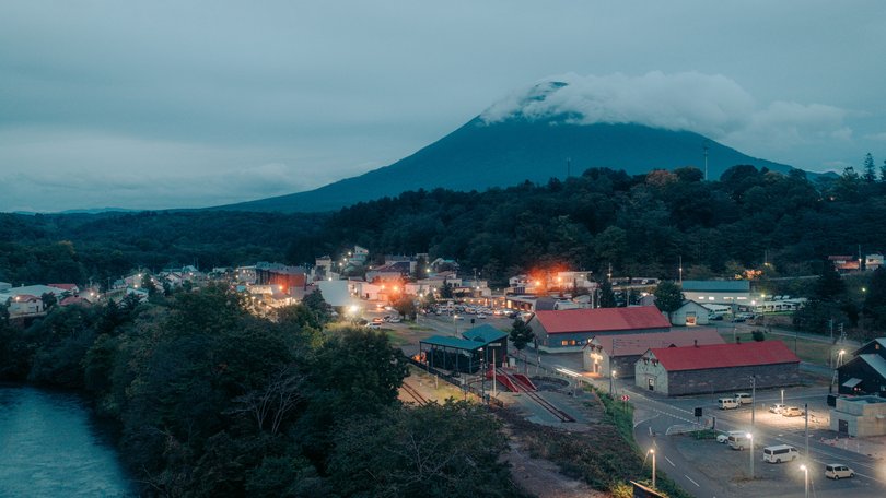 A view of the town of Niseko, Japan, near the internationally renowned Niseko ski slopes and resort, Sept. 24, 2025. Some residents in the area are protesting a planned housing facility for foreign workers, exposing the conflict between Japan’s need for labor and anxieties over immigration. (Kentaro Takahashi/The New York Times)