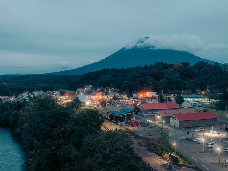 A view of the town of Niseko, Japan, near the internationally renowned Niseko ski slopes and resort, Sept. 24, 2025. Some residents in the area are protesting a planned housing facility for foreign workers, exposing the conflict between Japan’s need for labor and anxieties over immigration. (Kentaro Takahashi/The New York Times)