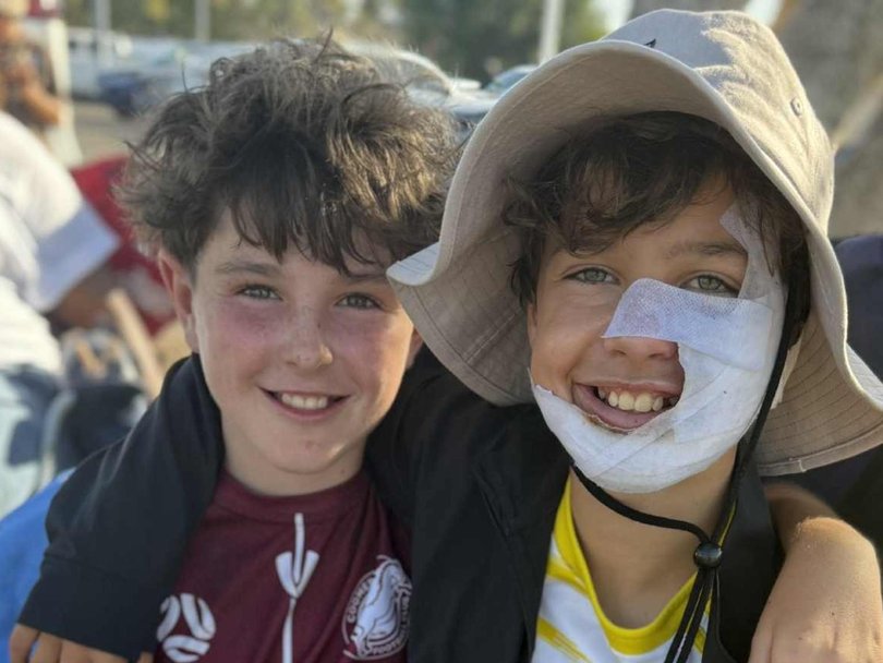 Lucas (right) was supposed to play representative futsal in Brisbane at the end of September.