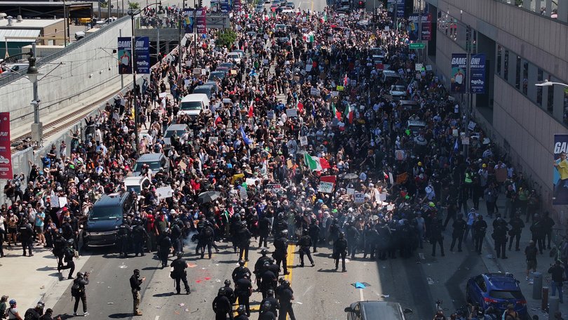 Protestors demanded immediate end to Immigration and Customs Enforcement (ICE) workplace raids in September. 