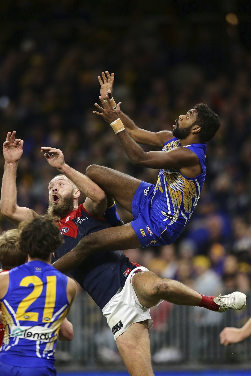 PERTH, AUSTRALIA - MAY 17: Liam Ryan of the Eagles marks the ball over Max Gawn of the Demons during the 2019 AFL round 09 match between the West Coast Eagles and the Melbourne Demons at Optus Stadium on May 17, 2019 in Perth, Australia. (Photo by Will Russell/AFL Photos)