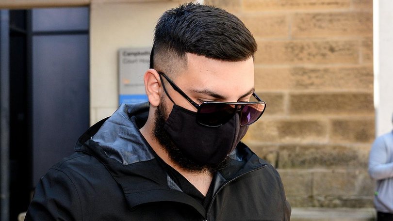 Adam Abdul-Hamid wore a black face mask throughout his court appearance over an alleged gang rape. 