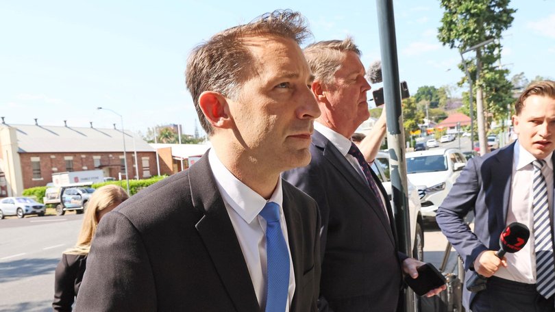 Mr Crawford (with blue tie) is contesting charges of murder and misconduct with a corpse. Picture: NewsWire/Tertius Pickard