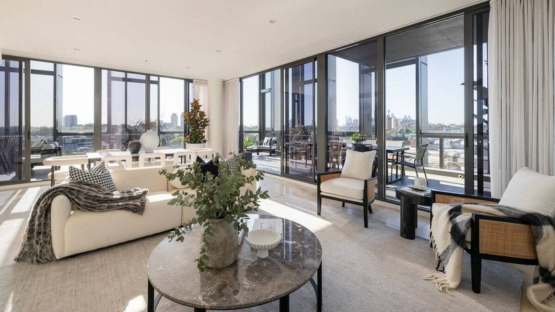 The apartment is a "true penthouse" with no walls shared with other apartments.