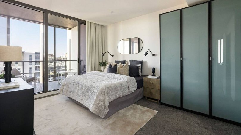 The master bedroom with balcony.