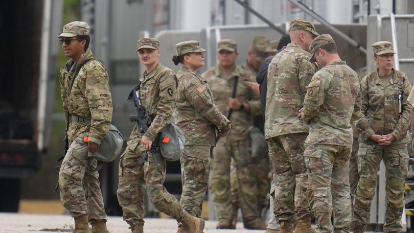 Texas National Guard troops assembled at an army reserve facility southwest of Chicago.