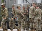 Texas National Guard troops assembled at an army reserve facility southwest of Chicago.