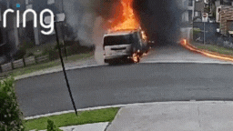 Flames spread as the car moved backward toward the residential street.