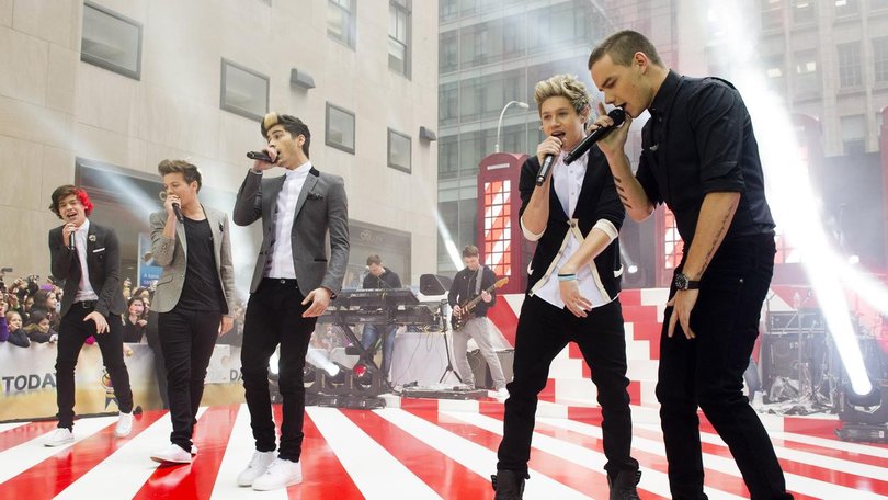 Lous Tomlinson's "just not sure it would be right" for 1D to reunite following Liam Payne's death. (AP PHOTO)