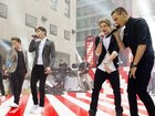 Lous Tomlinson's "just not sure it would be right" for 1D to reunite following Liam Payne's death. (AP PHOTO)