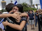 Israelis embrace and celebrate at Hostages Square in Tel Aviv, Israel.