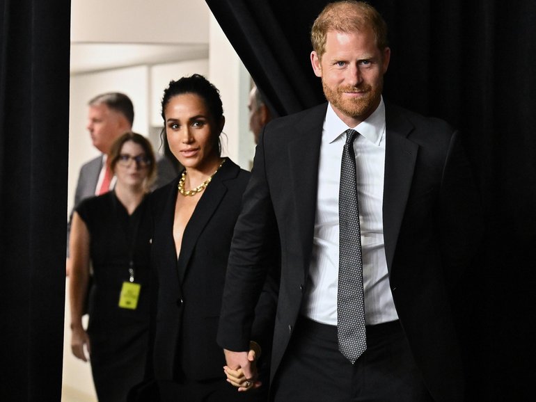 Meghan Markle, left, and Prince Harry, The Duke and Duchess of Sussex, attend the third annual World Mental Health Day Gala, hosted by Project Healthy Minds, at Spring Studios on Thursday, Oct. 9, 2025, in New York. (Photo by Evan Agostini/Invision/AP) Evan Agostini