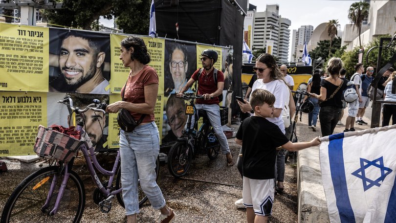 People flocked to what is known as Hostages Square in Tel Aviv, early Thursday. MUST CREDIT: Heidi Levine/For The Washington Post