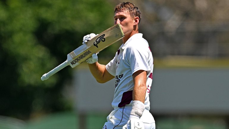 Marnus Labuschagne celebrating his century during day three of the Sheffield Shield match between Queensland and Tasmania.