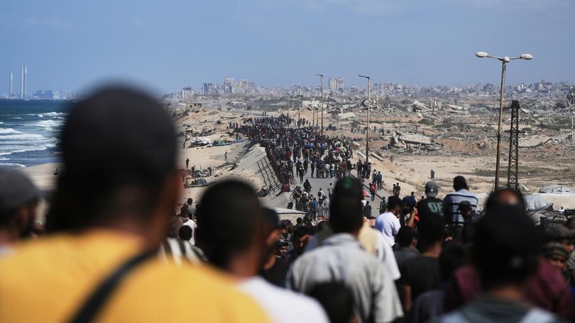 A massive column of displaced Palestinians is heading to northern Gaza as the ceasefire sets in. (AP PHOTO)