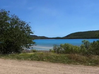 A teenager has been airlifted to hospital after being bitten by a shark in Far North Queensland.