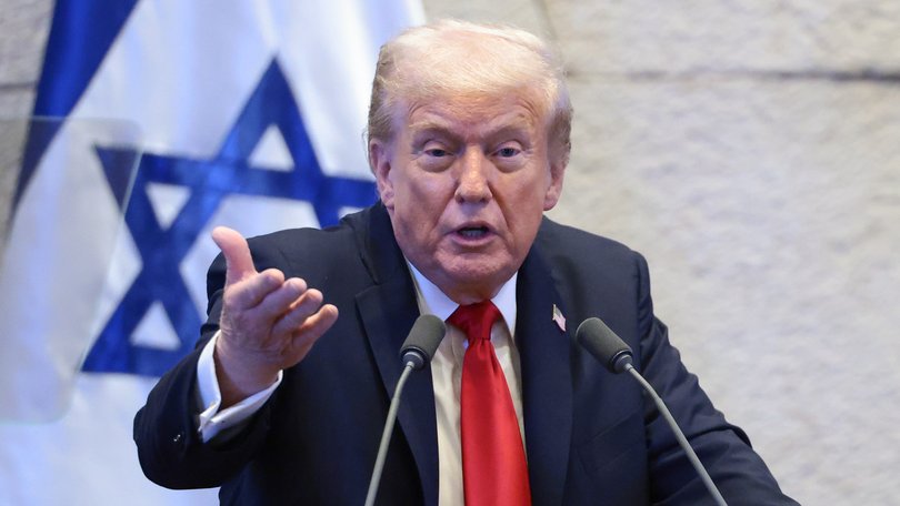 President Donald Trump addresses the Knesset, Israel's parliament, on October 13, 2025 in Jerusalem. 