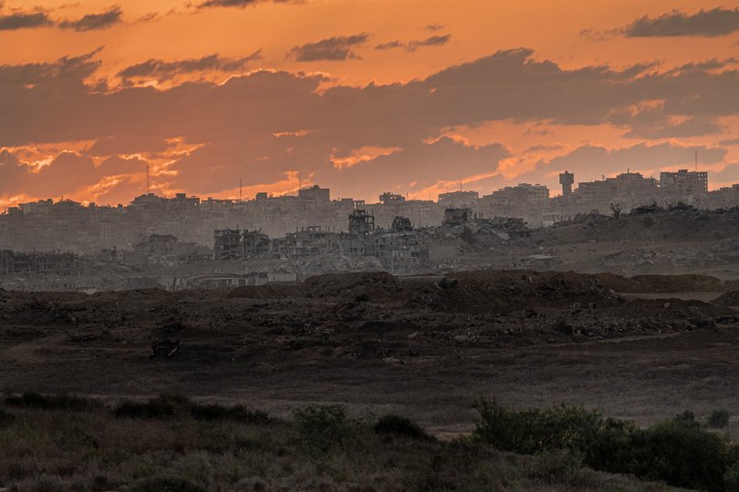 A view from Sderot, Israel at sunset of destroyed buildings in the southern Gaza Strip, Oct.10, 2025. 