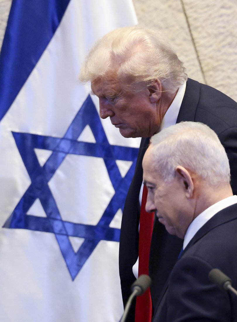 U.S. President Donald Trump and Israeli Prime Minister Benjamin Netanyahu at the Knesset, Israel's parliament, on October 13, 2025 in Jerusalem. 