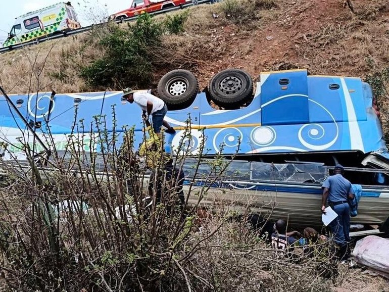 Rescuers pulled scored of victims from a bus that crashed off a mountain road in South Africa.