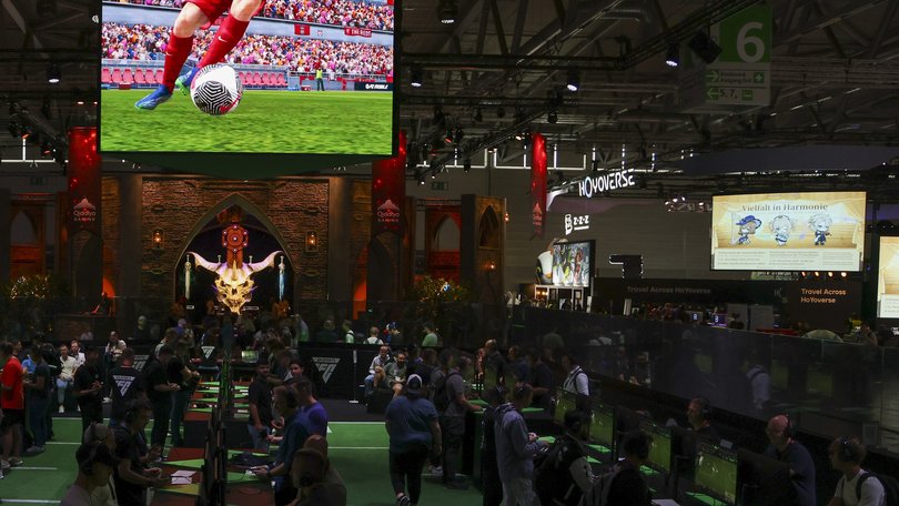 Visitors play EA Sports. Saudi Arabia’s sovereign wealth fund is among the buyers of Electronic Arts.