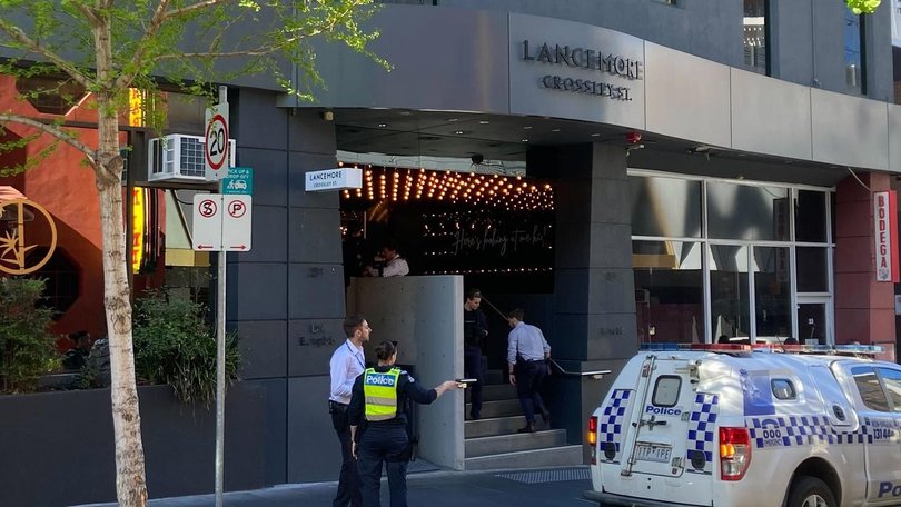 Tactical officers swarmed the Melbourne city hotel.