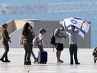 Vicki Cohen, second from left, with her son Nimrod, right, following his release from Hamas captivity. 