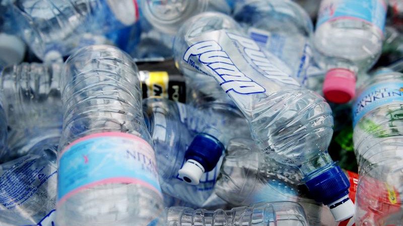Plastic bottles in landfill.