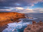 Evening golden sunlight reflecting off the sea cliffs on Dirk Hartog Island, Western Australia
