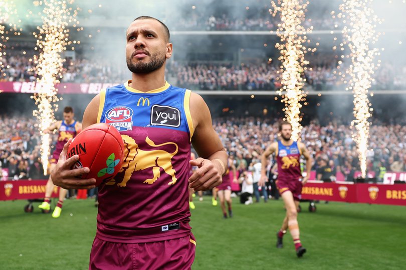 MELBOURNE, AUSTRALIA - SEPTEMBER 27: Callum Ah Chee of the Lions runs onto the field during the AFL Grand Final match between Geelong Cats and Brisbane Lions at Melbourne Cricket Ground on September 27, 2025 in Melbourne, Australia. (Photo by Cameron Spencer/AFL Photos/via Getty Images)