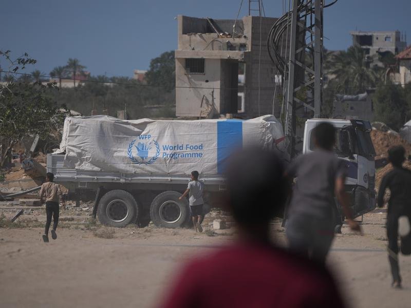 The World Food Programme says its trucks arrived in the Gaza Strip for the first time in two days. (AP PHOTO)