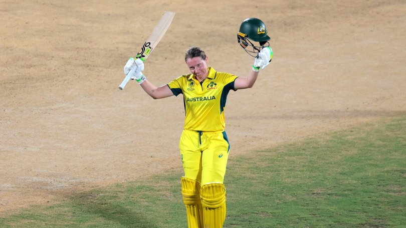 Alyssa Healy of Australia celebrates her century.