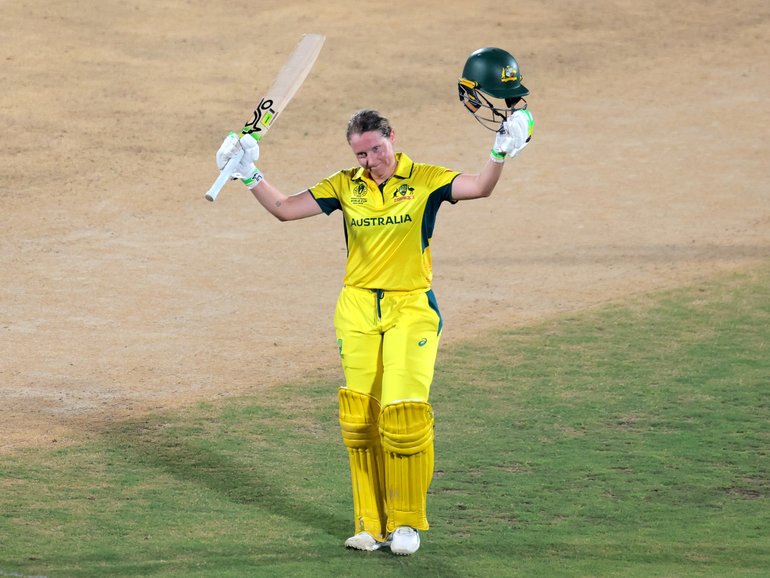 Alyssa Healy of Australia celebrates her century.