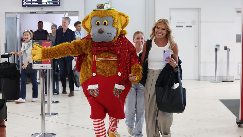 Sonia Kruger is greeted by Fat Cat at Perth Airport ahead of Telethon.