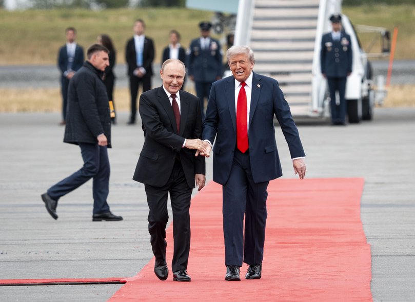 President Donald Trump greets President Vladimir Putin at Joint Base Elmendorf-Richardson in Anchorage, Alaska, on Friday, August 15, 2025.