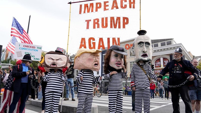 Demonstrators dress up as they bring their No Kings protest to the national Mall in Washington DC.