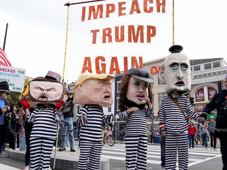 Demonstrators dress up as they bring their No Kings protest to the national Mall in Washington DC. 