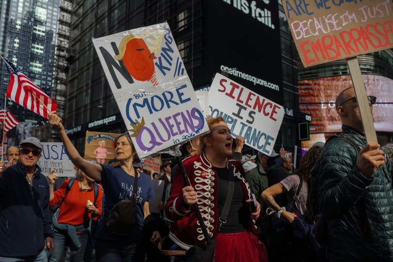 Protesters march during a "No Kings" protest Saturday, Oct. 18, 2025, in New York. (AP Photo/Olga Fedorova)