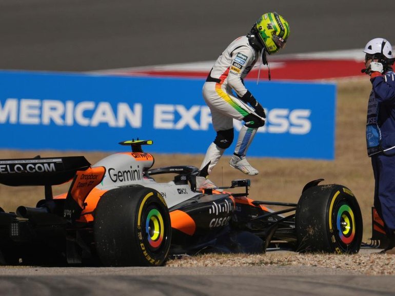 McLaren's Lando Norris leaves his damaged car during the sprint race in Austin, Texas. (AP PHOTO)