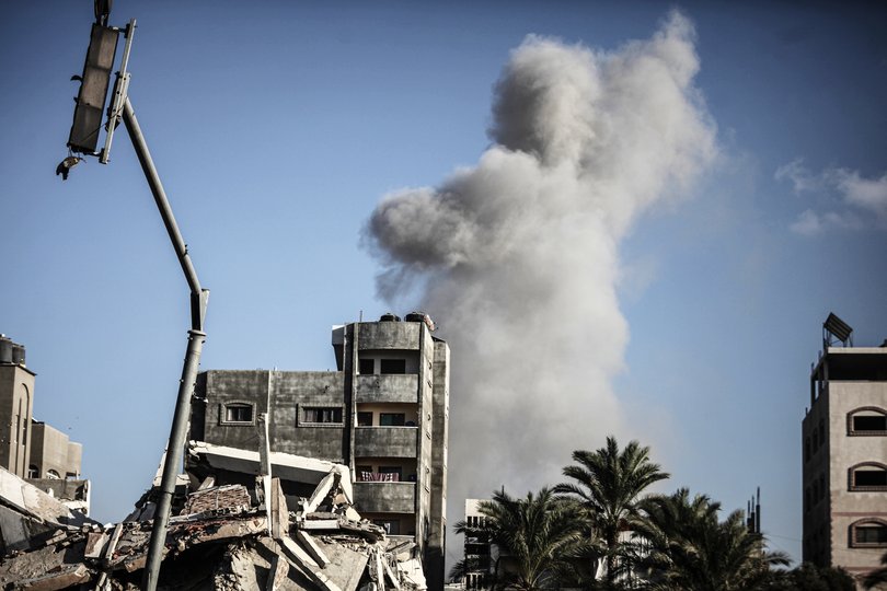 Smoke rises after Israeli airstrike hit al-Bureij camp despite ceasefire in Gaza Strip.