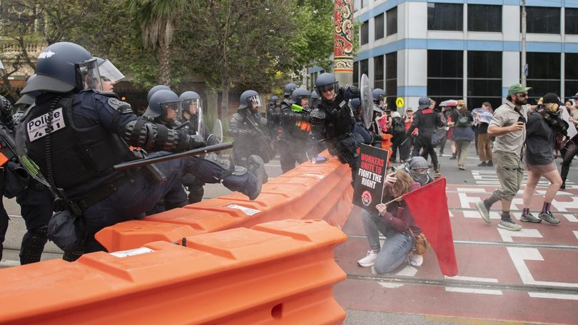 One woman is expected to be charged over the ugly clashes at an anti-immigration rally in Melbourne.
