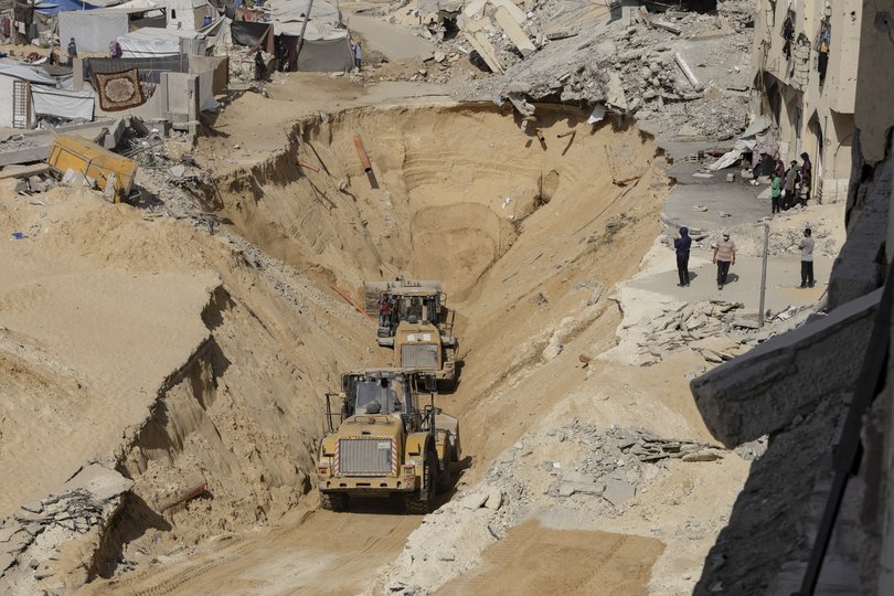 Heavy machinery operates at a site in Khan Younis, southern Gaza Strip, where searches are underway for deceased hostages kidnapped by Hamas during the Oct. 7, 2023, attack on Israel.