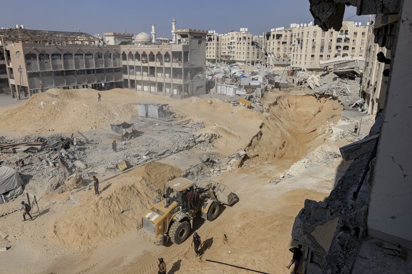Heavy machinery operates at a site in Khan Younis, southern Gaza Strip.
